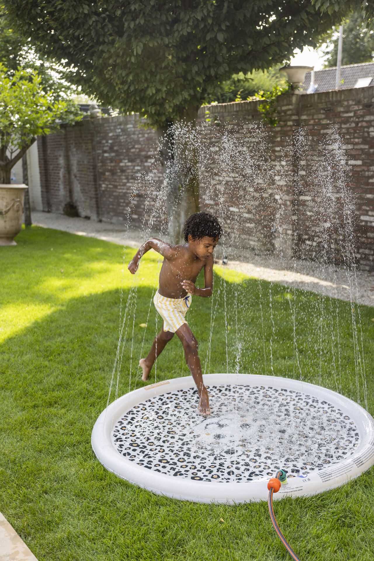 Sprinkler-mat-met-luipaarmotief