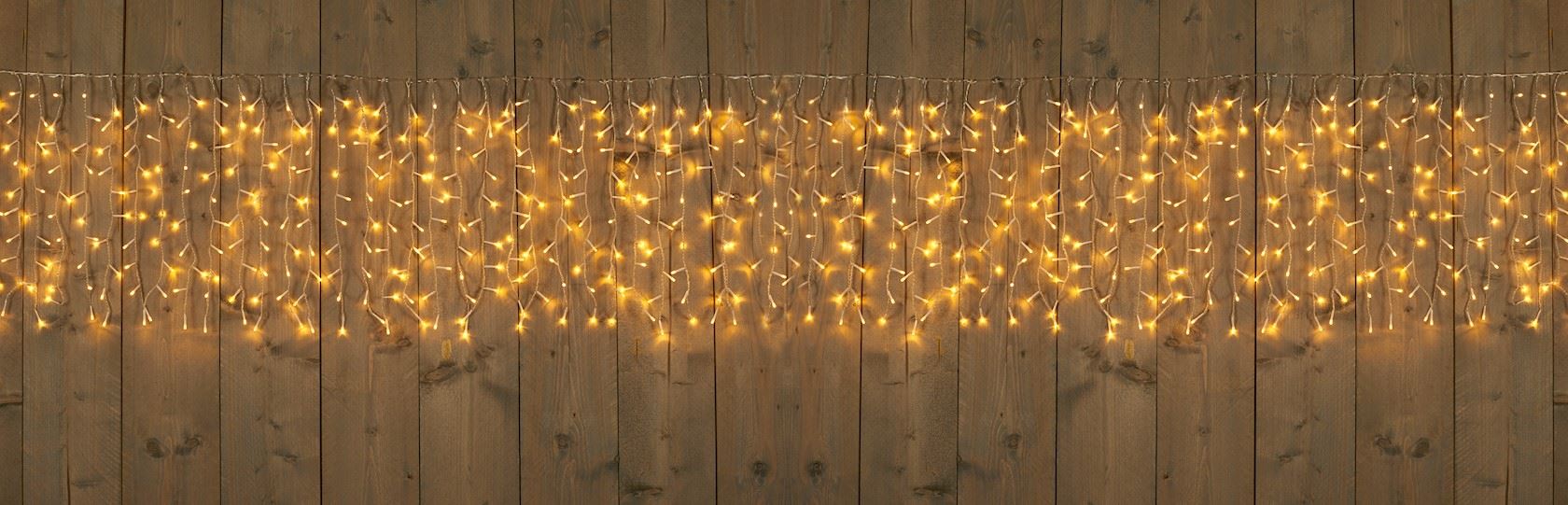 gordijnverlichting-outdoor-100-strengen-1000l-500x50cm-led-warm-wit-5m-aanloopsnoer-transparant-31v-ip44-9va-trafo-timer-8-16u